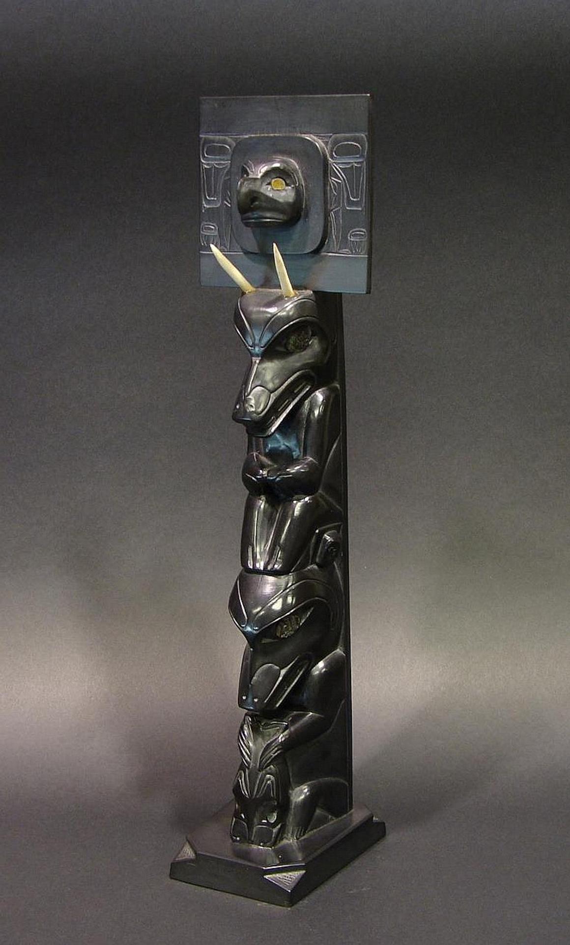 Rufus Moody (1923-1998) - a large argillite carving in the form of a mortuary pole