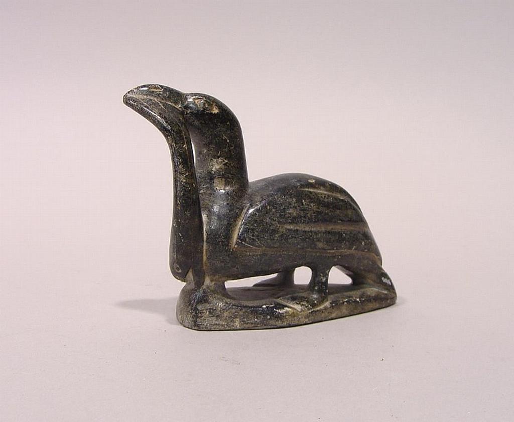 Dania Koma - a soapstone carving of a bird with a fish in its mouth