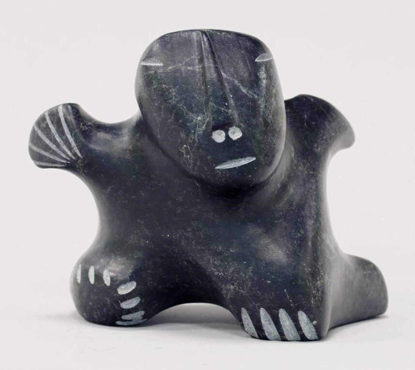 George Arlook Arluk (1949) - Black stone carving of an Abstracted Figure