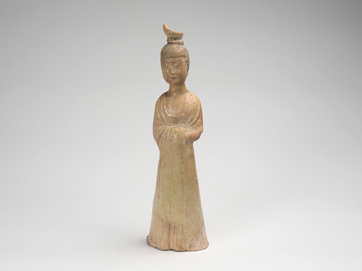 Chinese Art - A Chinese Straw Glazed Earthenware Figure of a Female Attendant, Tang Dynasty (618-907 CE)