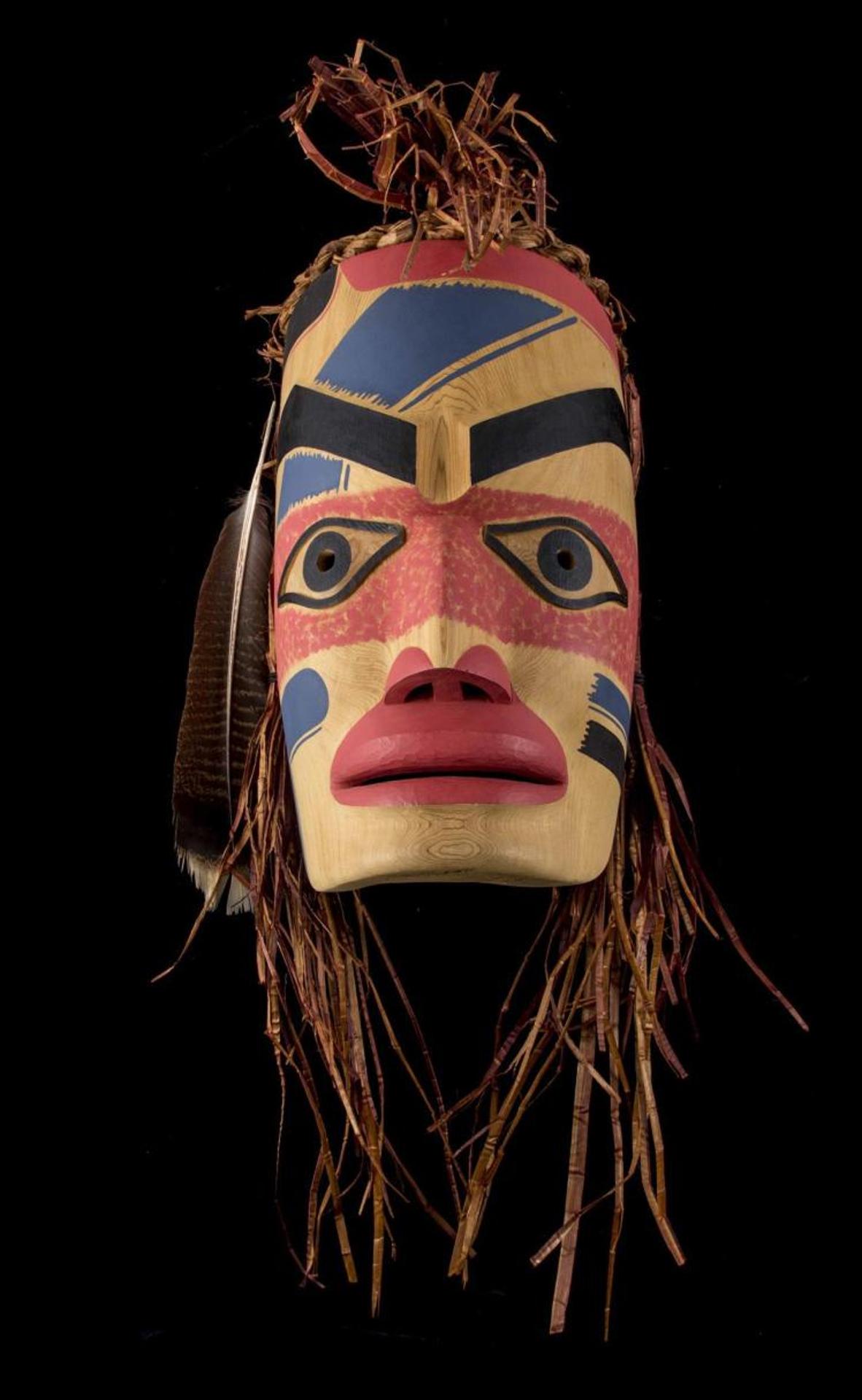 Douglas David - a carved and polychromed cedar Ancestor mask with cedar strip hair