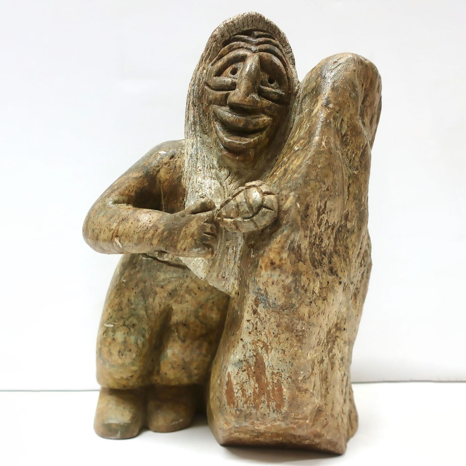 Sandy Cleveland (1949-2015) - Figure With Rattle Hugging Rock
