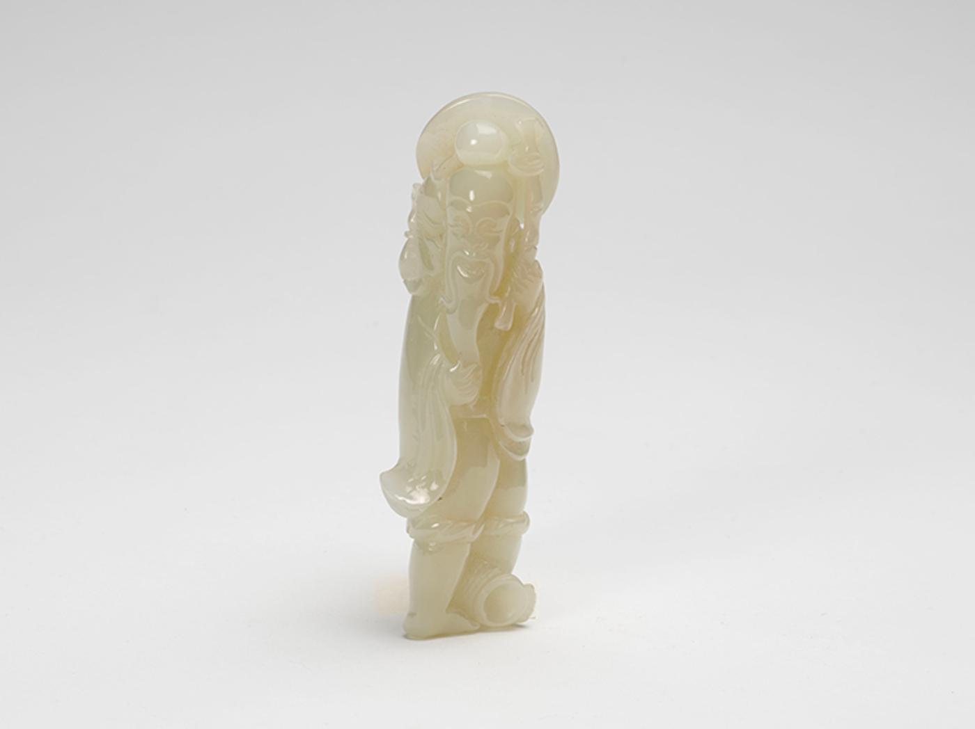 Chinese Art - A Chinese White Jade Carved Fisherman, 20th Century