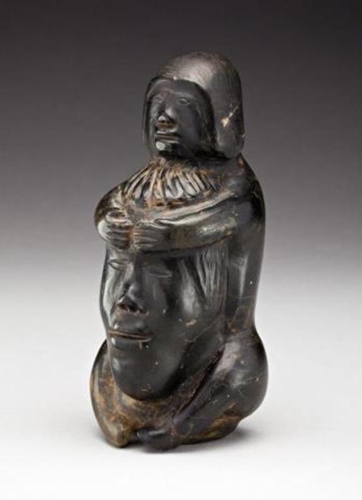Aggiuq Takunaraq (1911) - Male Figure Holding a Spirit Face