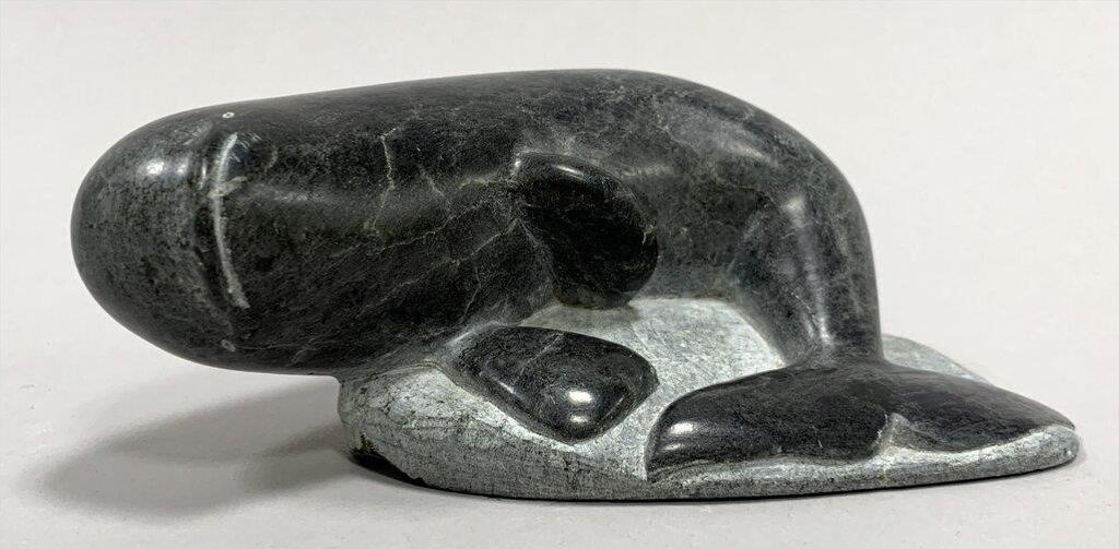 Qoomaluk Likely Levi Qumaluk (1919-1997) - a grey stone carving of a Beluga