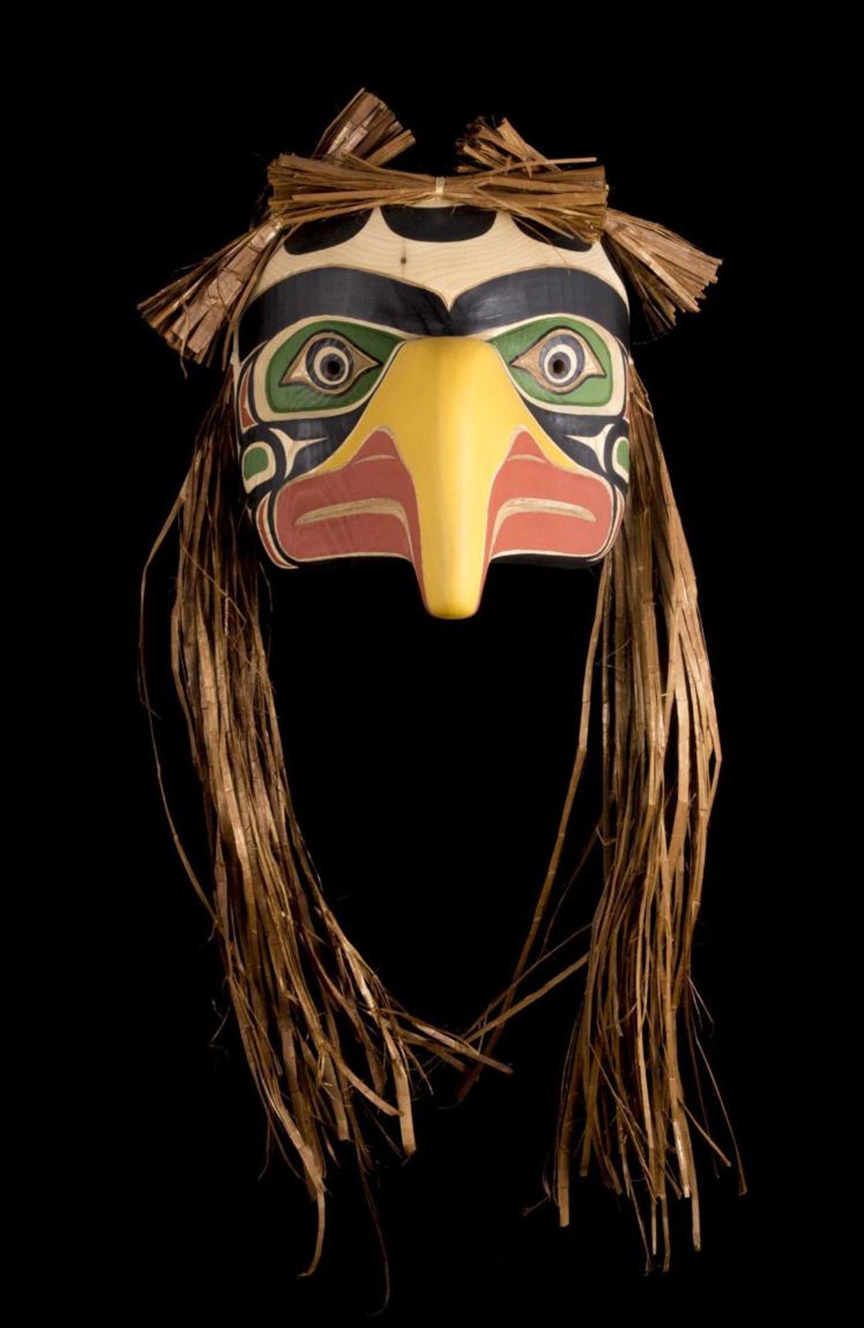 Matthew Baker - a carved and polychromed Eagle mask with cedar strip hair