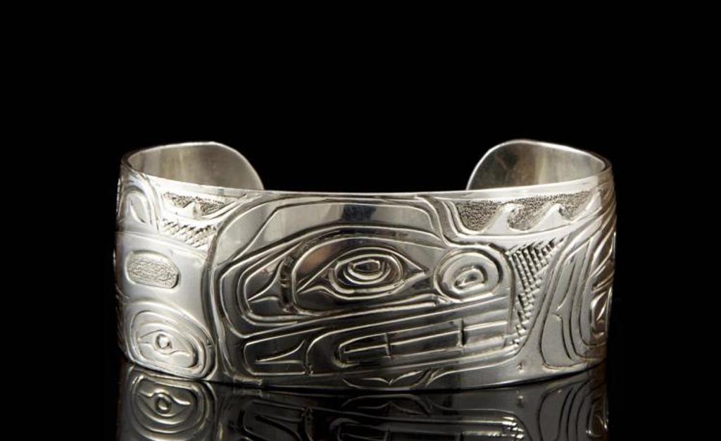 Don Wadhams - a silver cuff bracelet with Killer whale design