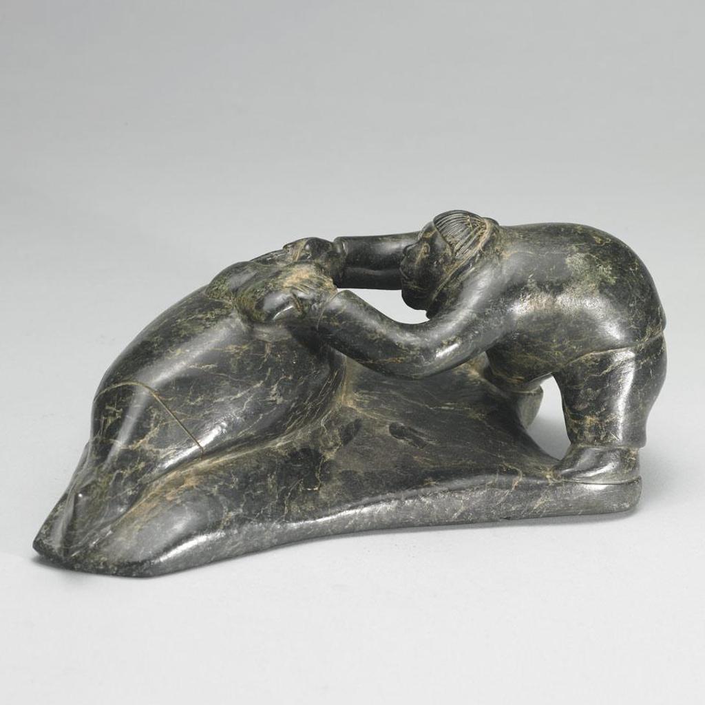 Ningiuq Kiatainaq (1918) - Hunter Flensing A Seal