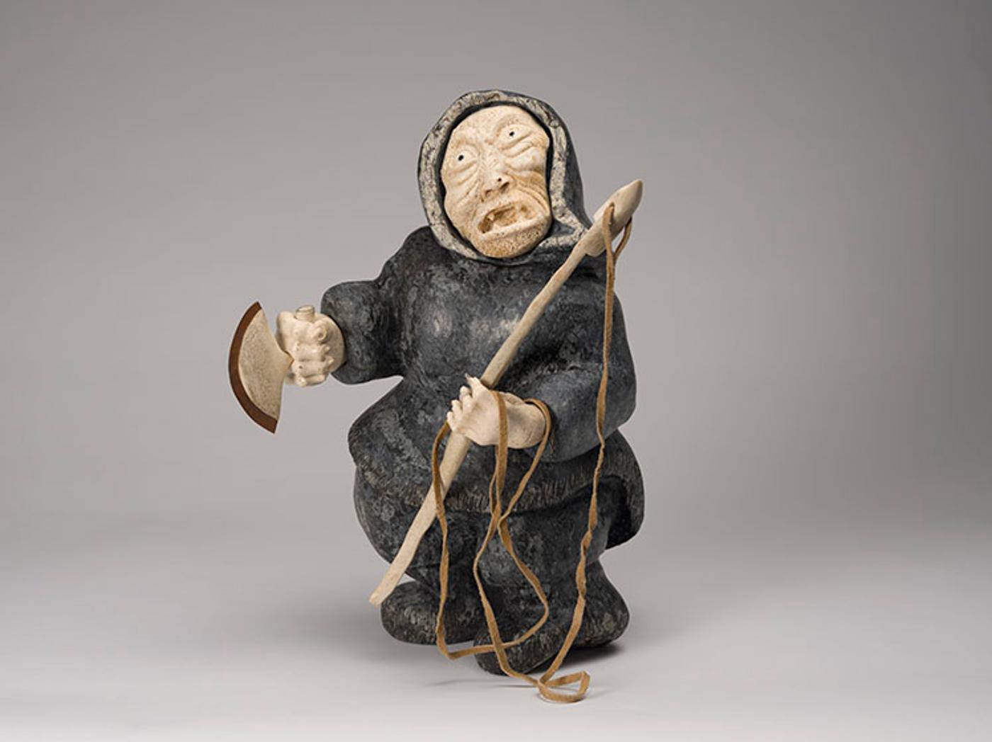 Joseph Shuqslak (1958) - Old Woman with Harpoon and Ulu