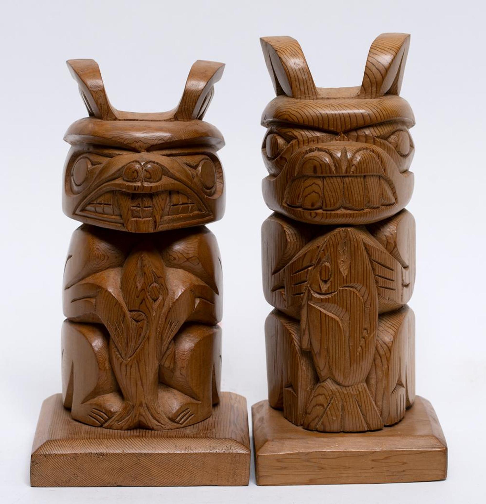 R. Swift - Two Carved Cedar Totems