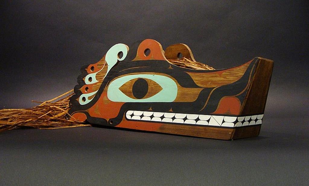 John Goodwin - a carved and polychromed Makah headdress with cedar strip hair