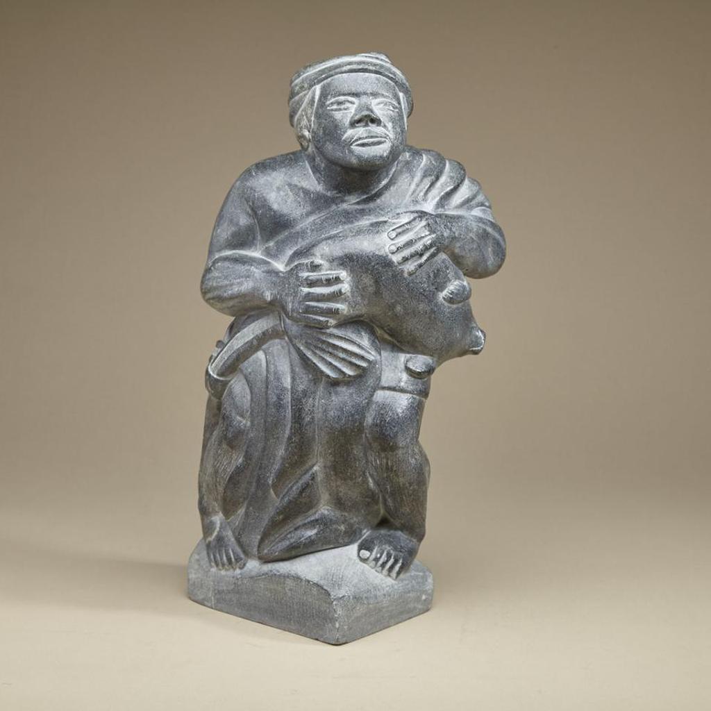 Nutaraluk Uilia Iyaituk (1943-2005) - Robed Man Holding Seal