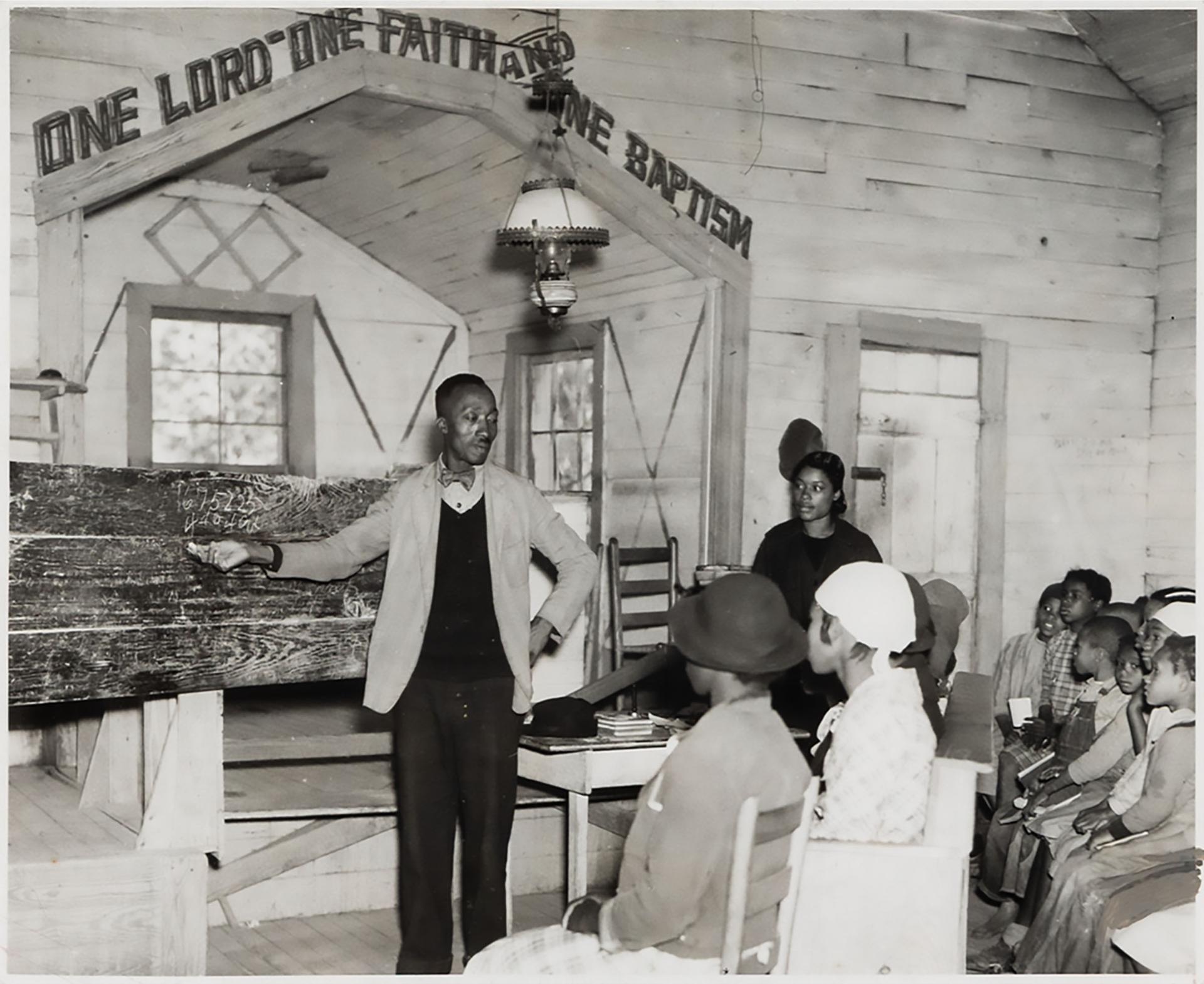 Arthur Rothstein - Conducting School In The Church, Gees Bend, Alabama, 1937
