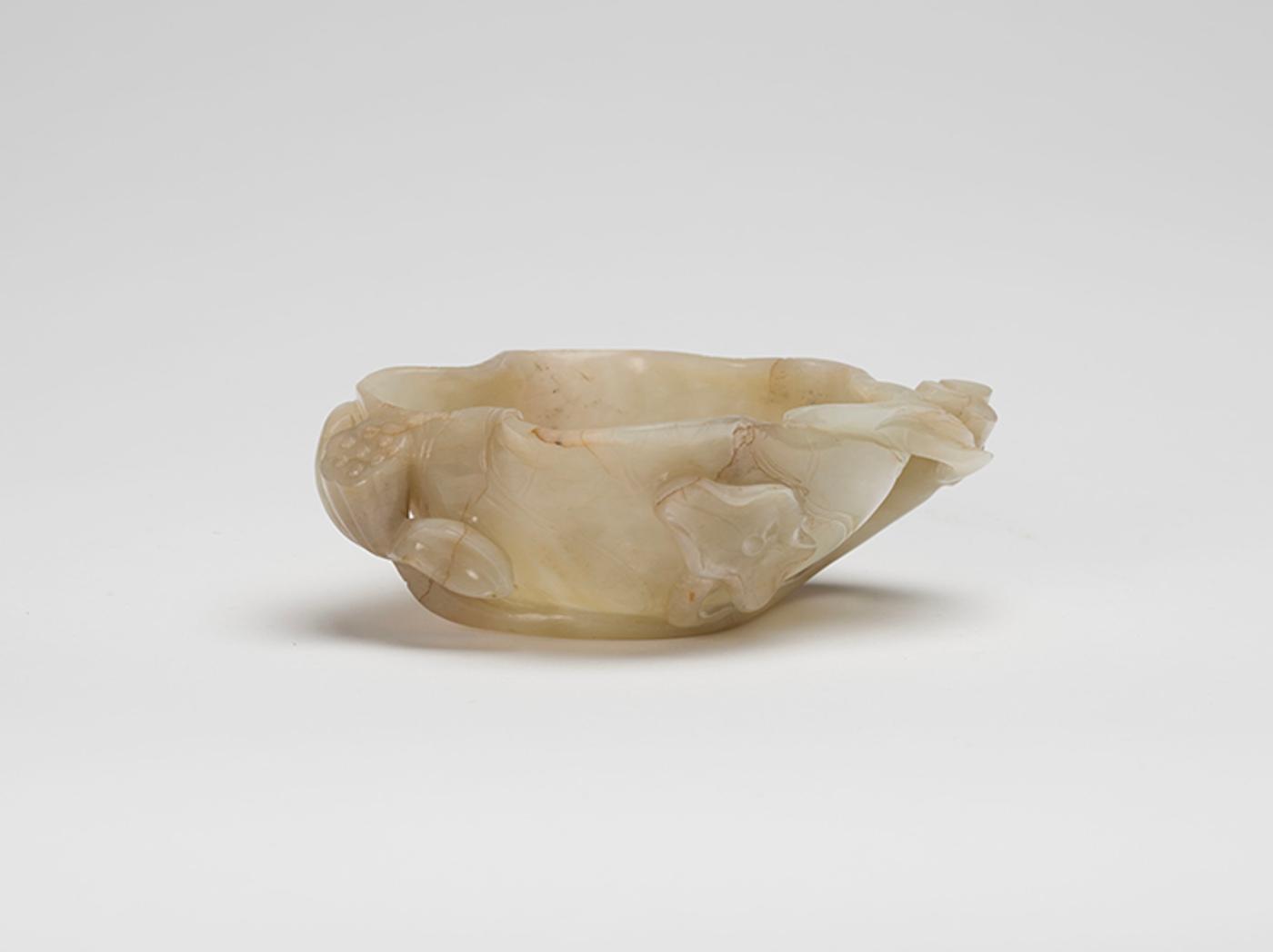 Chinese Art - A Chinese Mottled Pale Celadon Jade Lotus Cup, 17th Century