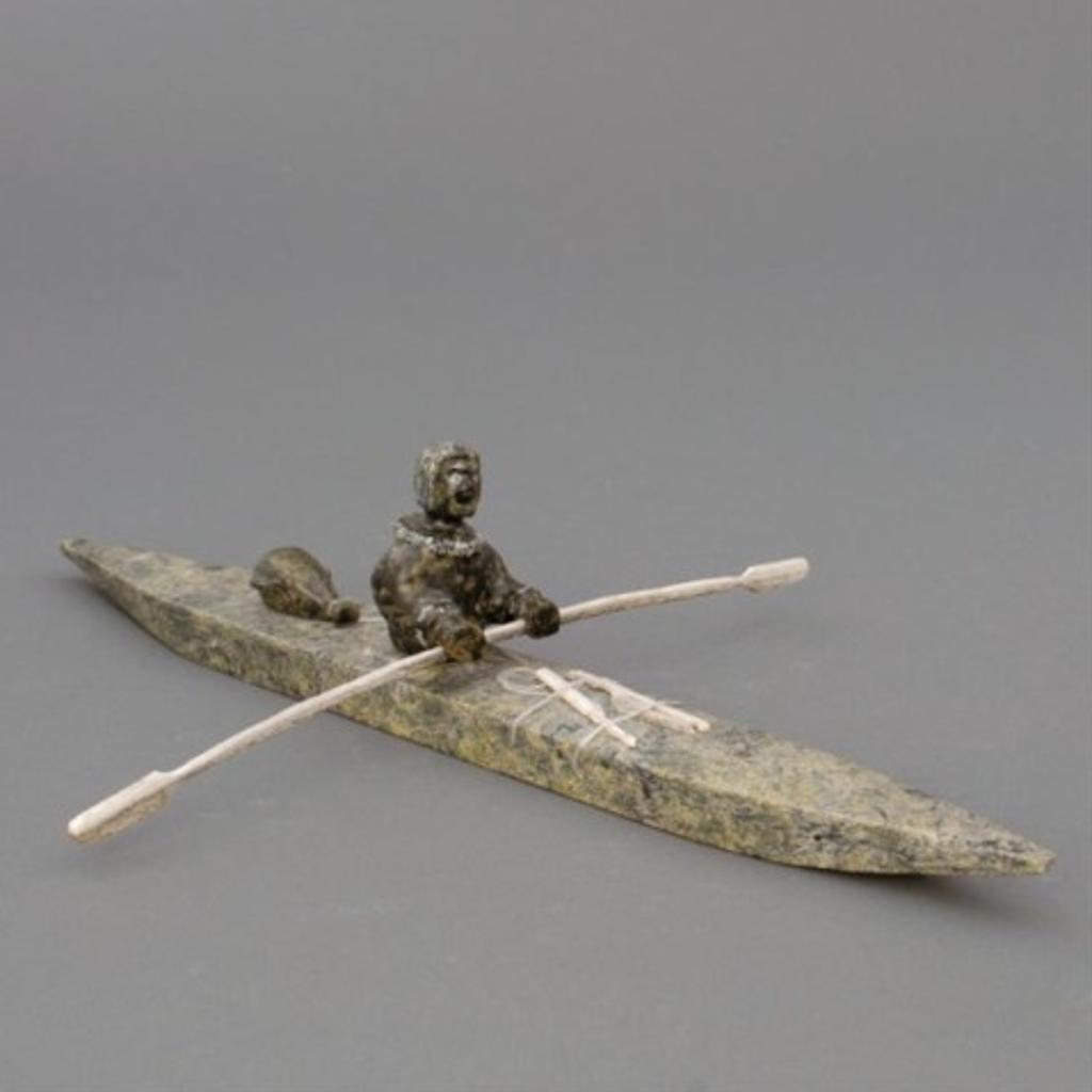 Noah Mark - Carved stone model of a hunter in kayak