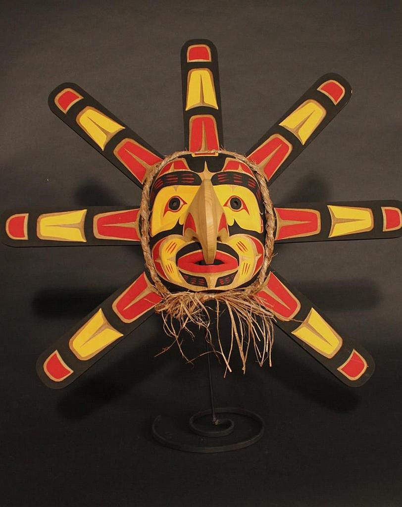 Gerald Thibert - a carved and polychromed Hawk man Sun mask