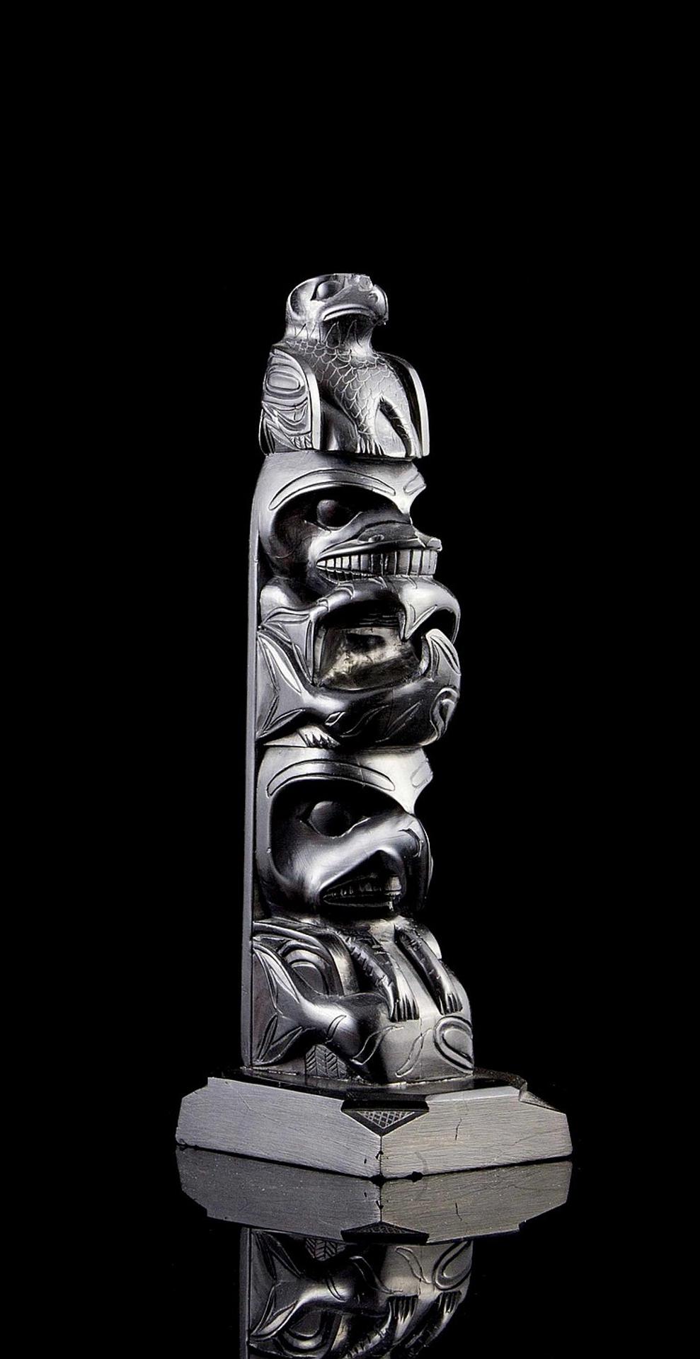 Rufus Moody (1923-1998) - a carved argillite totem pole depicting Eagle