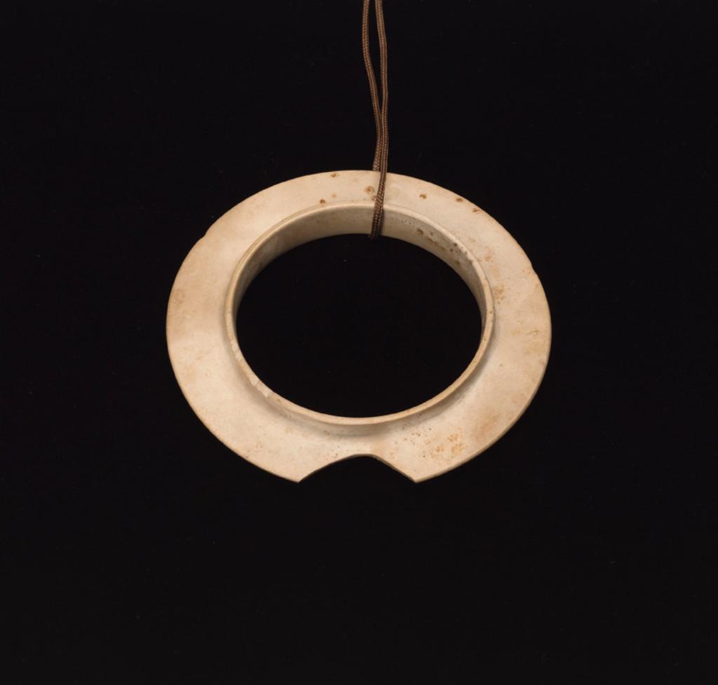 Chinese Art - A Chinese 'Chicken Bone' Jade Collared Disc, Bi, Shang Dynasty