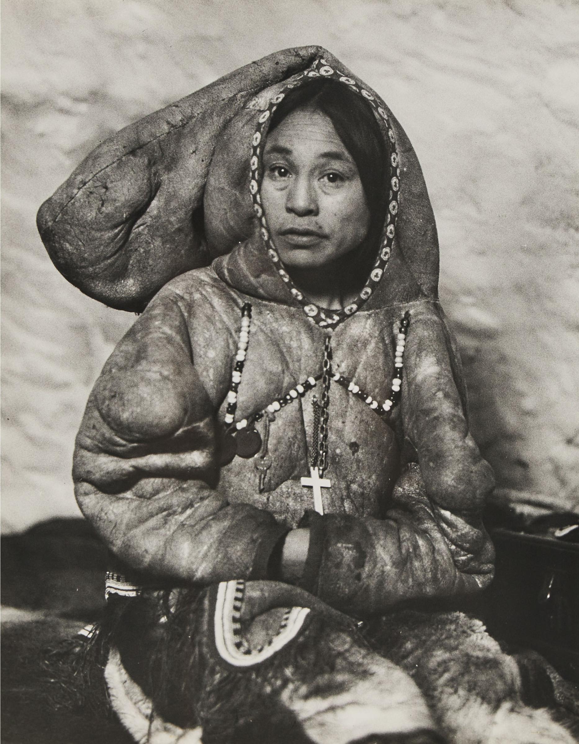 Richard Harrington (1911-2005) - An Inuit Woman In Her Igloo At Eskimo Point, 1950