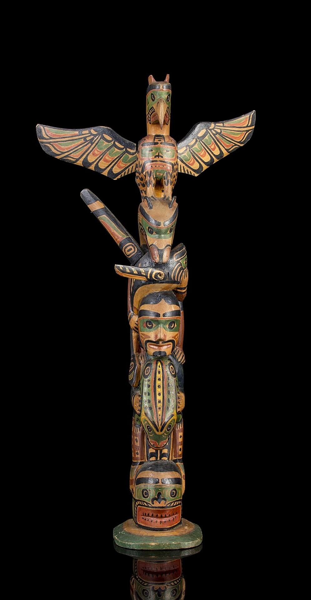 Charlie James (1865-1961) - a carved and polychromed cedar pole depicting Thunderbird