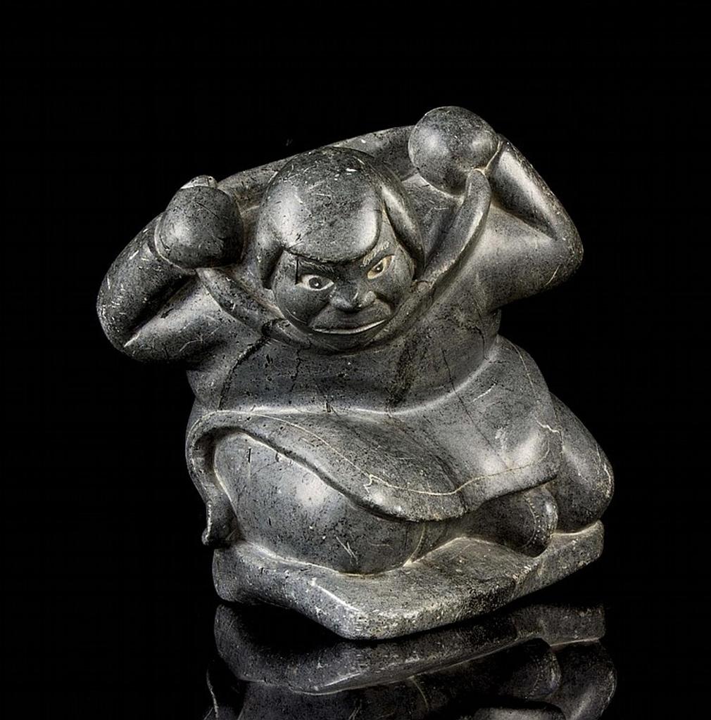 Isa Sheeq - a green stone carving of an Inuk