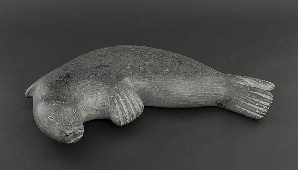 Mark Taletok - a grey stone carving of a seal