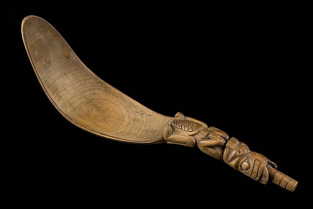 Doreen Jensen - a carved wood spoon with the handle in the form of a beaver