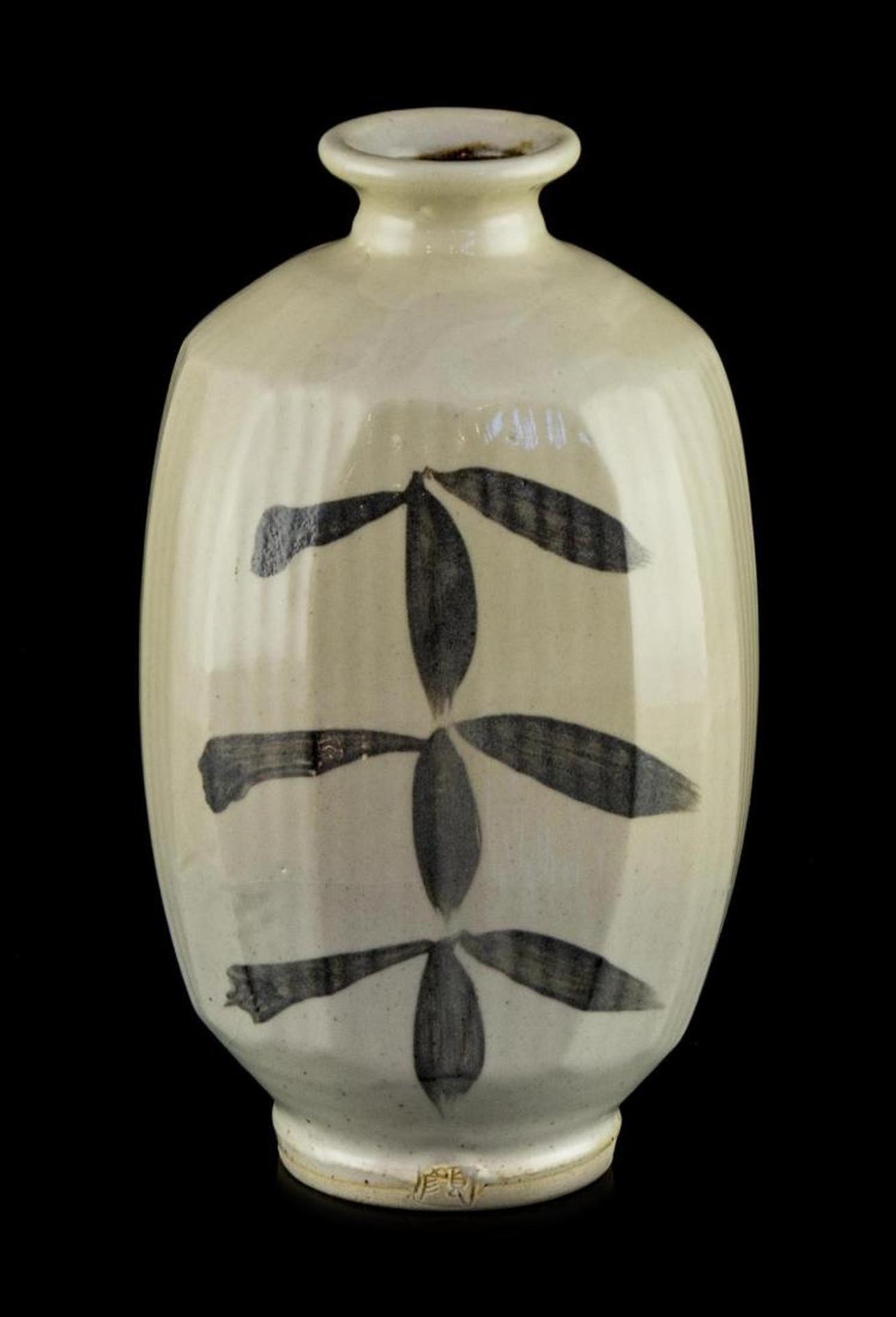 Wayne G. Ngan (1937-2020) - a tall ceramic ovoid vase having a pale grey glaze with bamboo leaf design