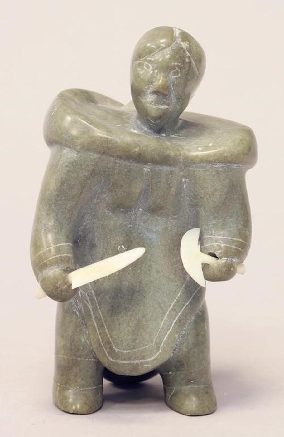 Mina Mannuk (1934) - A light green carving of a Woman with Baby in Amaut