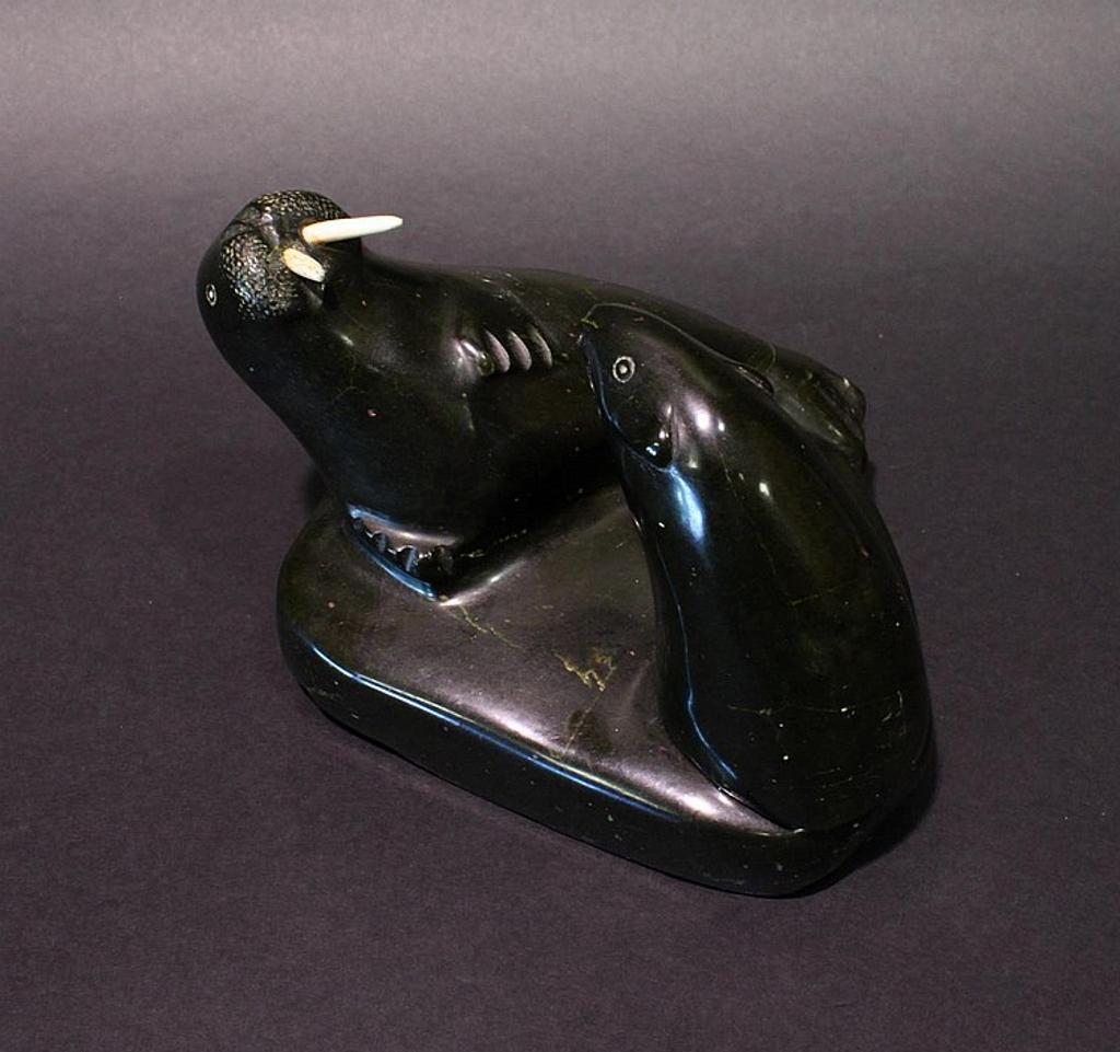 Peterloosie - a green soapstone carving of a walrus and polar bear