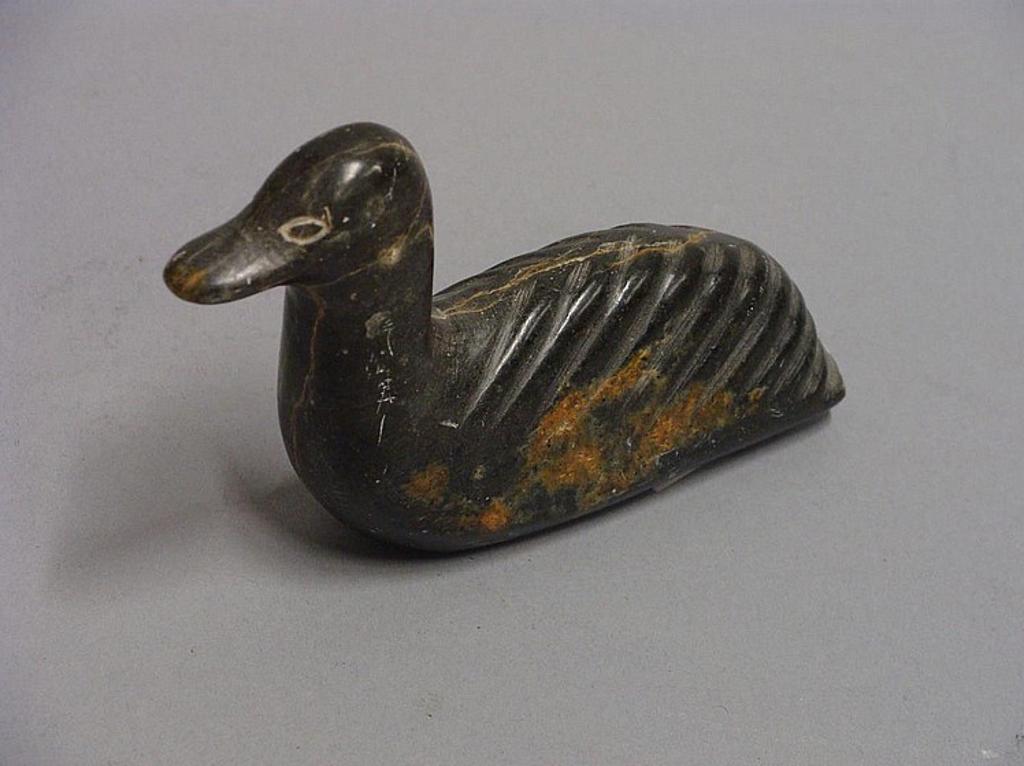 Moses - Port Harrison a green soapstone carving of a bird