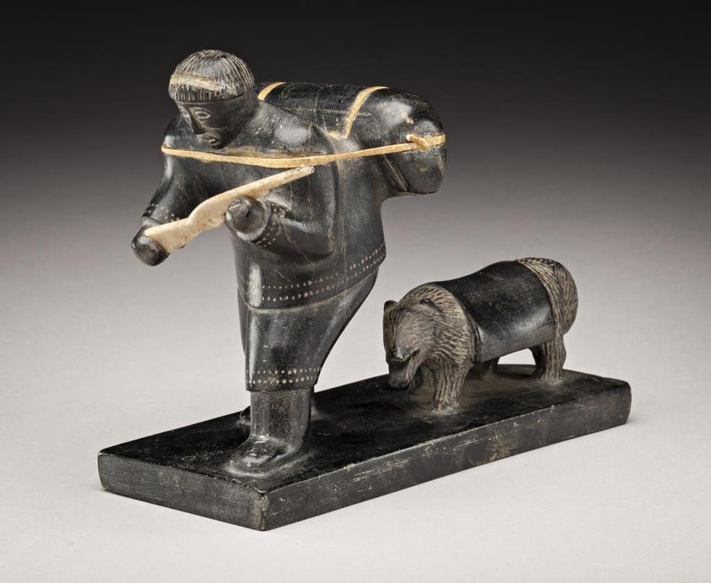 Paulusi Angmarlik (1911) - Pangnirtung, Hunter and Pack Dog, late 1950s, stone