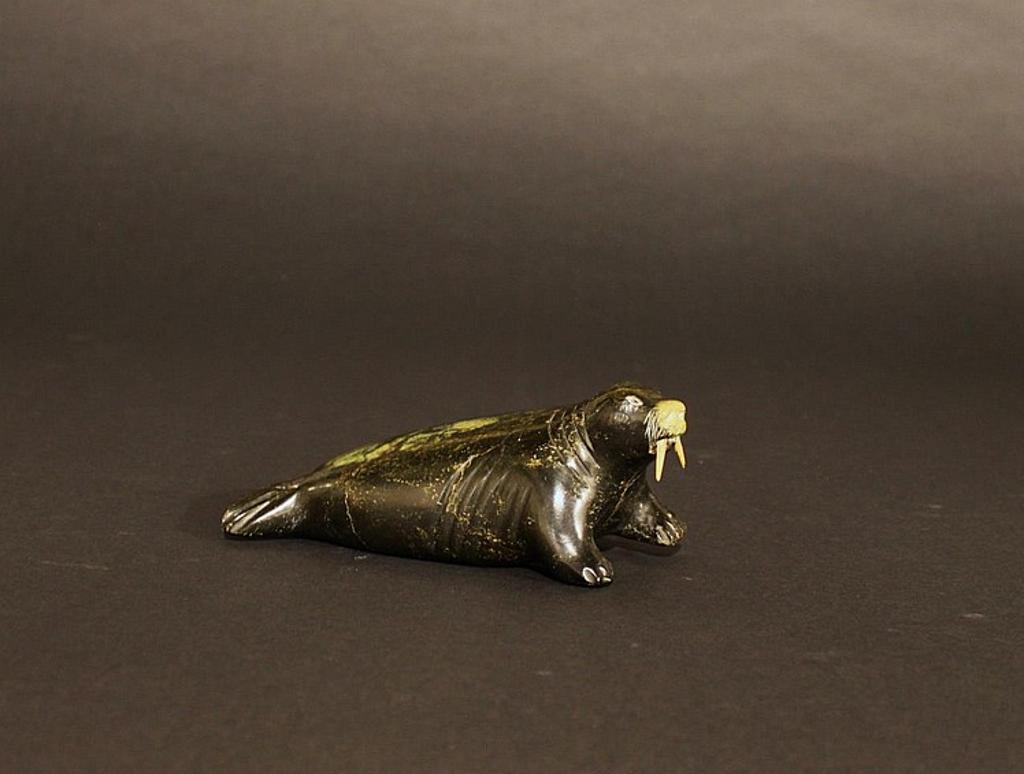 A. Komak - a soapstone carving of a walrus with horn tusks
