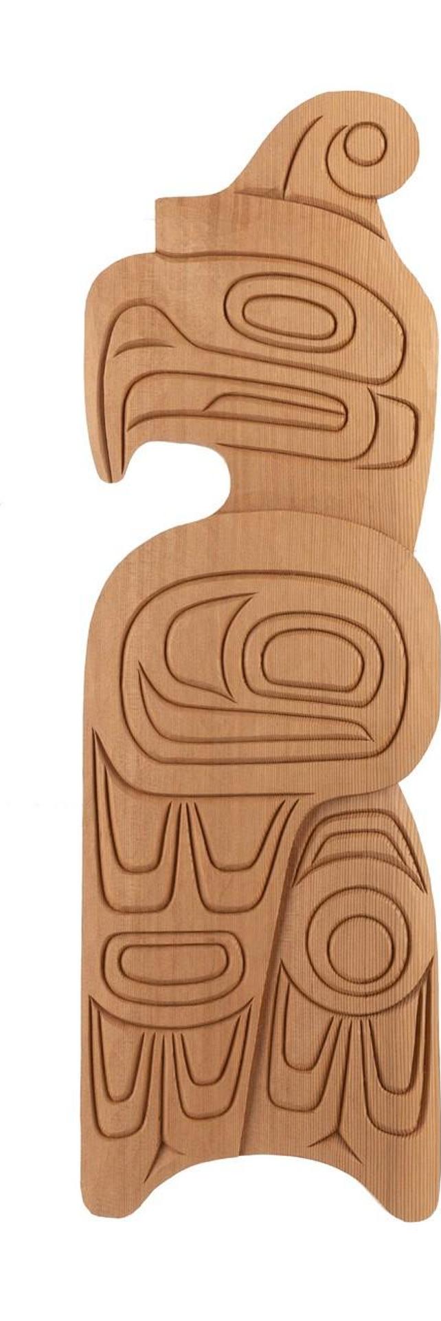 Jim Charlie (1967) - a carved cedar plaque depicting Thunderbird