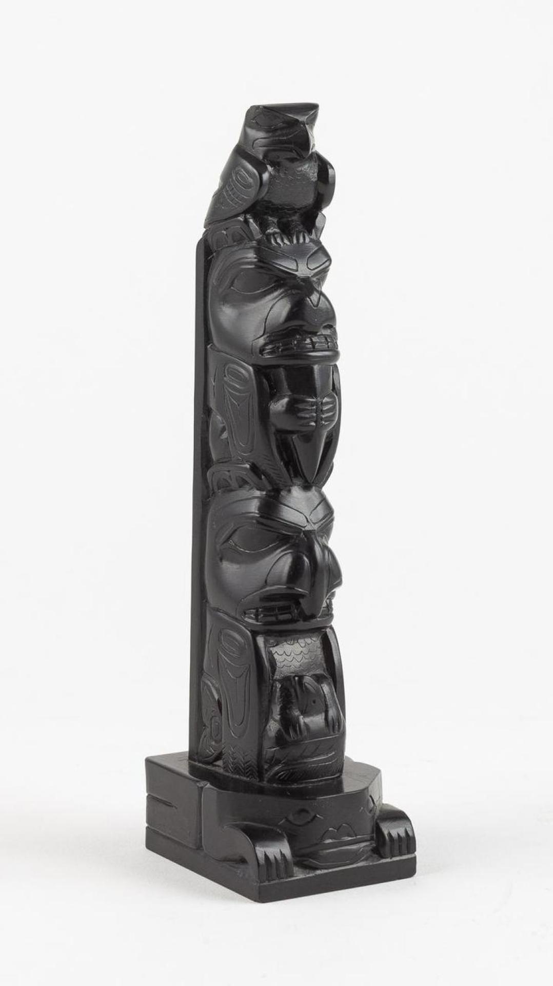Tom Hans (1925) - a carved argillite totem pole