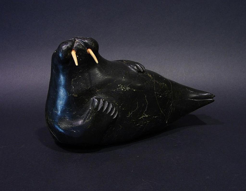 Itigayaqyuaq Etungat (1923) - Cape Dorset a soapstone carving of a reclining walrus