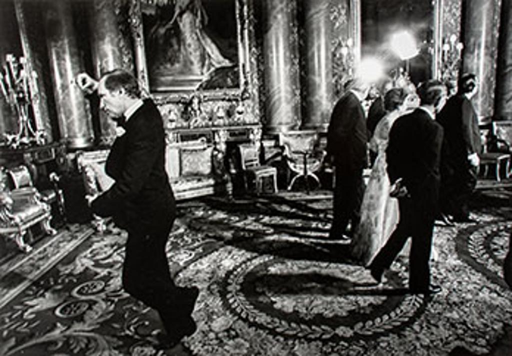 Doug Ball (1953) - Prime Minister Pierre Trudeau, shown performing his famous pirouette during a May 7, 1977, picture session at Buckingham Palace in London