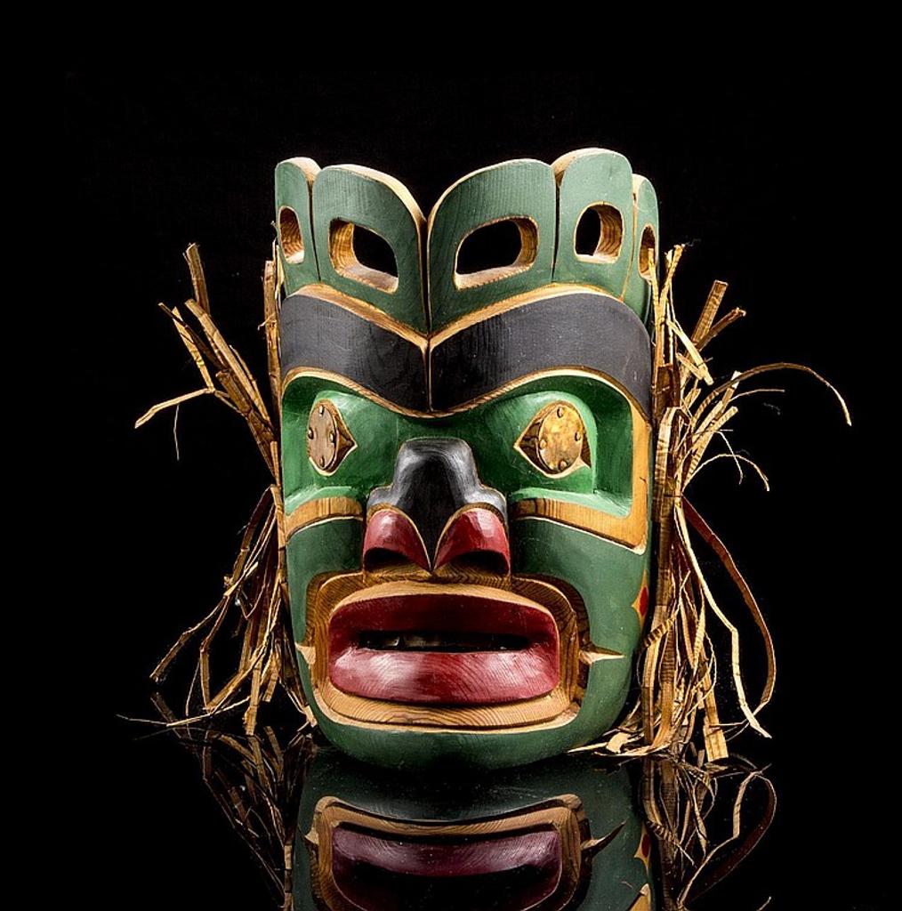 Christine Roberts - a carved and polychromed cedar mask with copper eyes and teeth