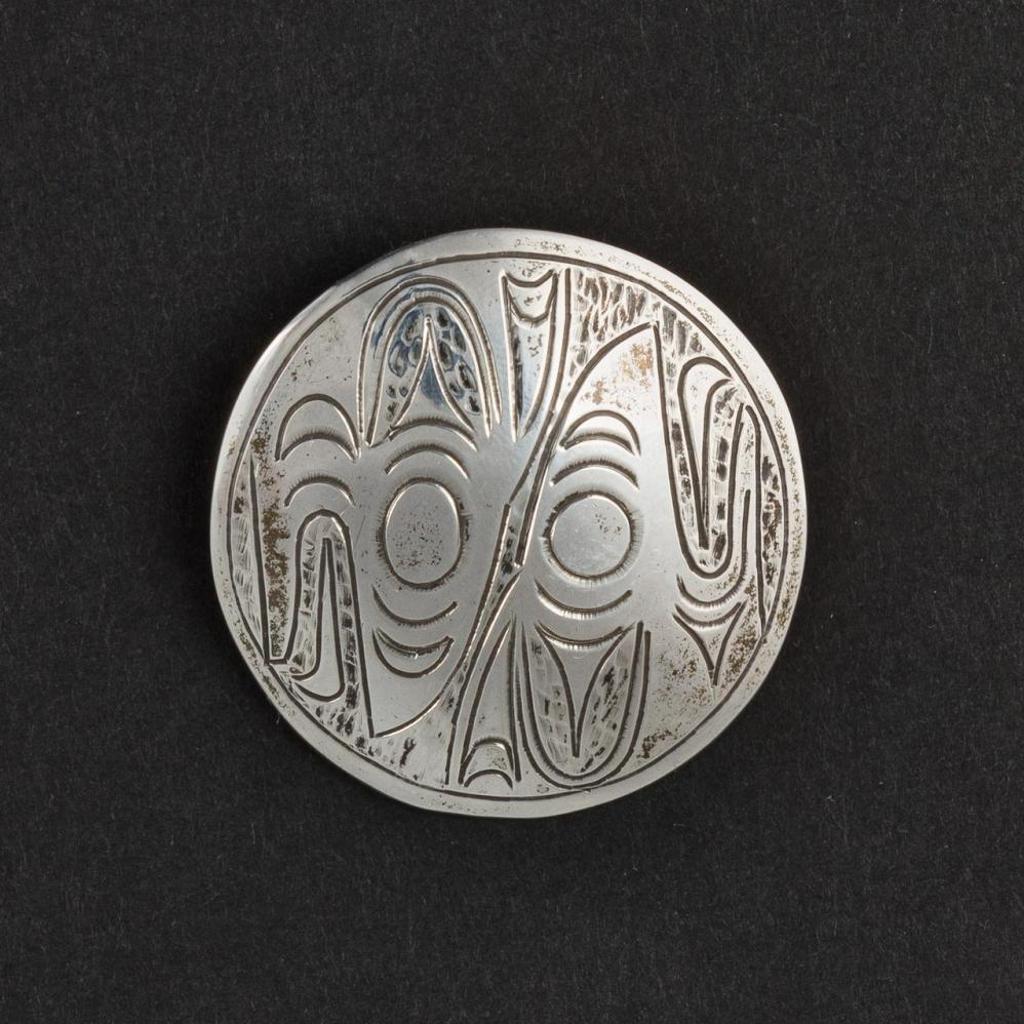 Susan A. Sparrow Point (1952) - a round hard carved silver pendant