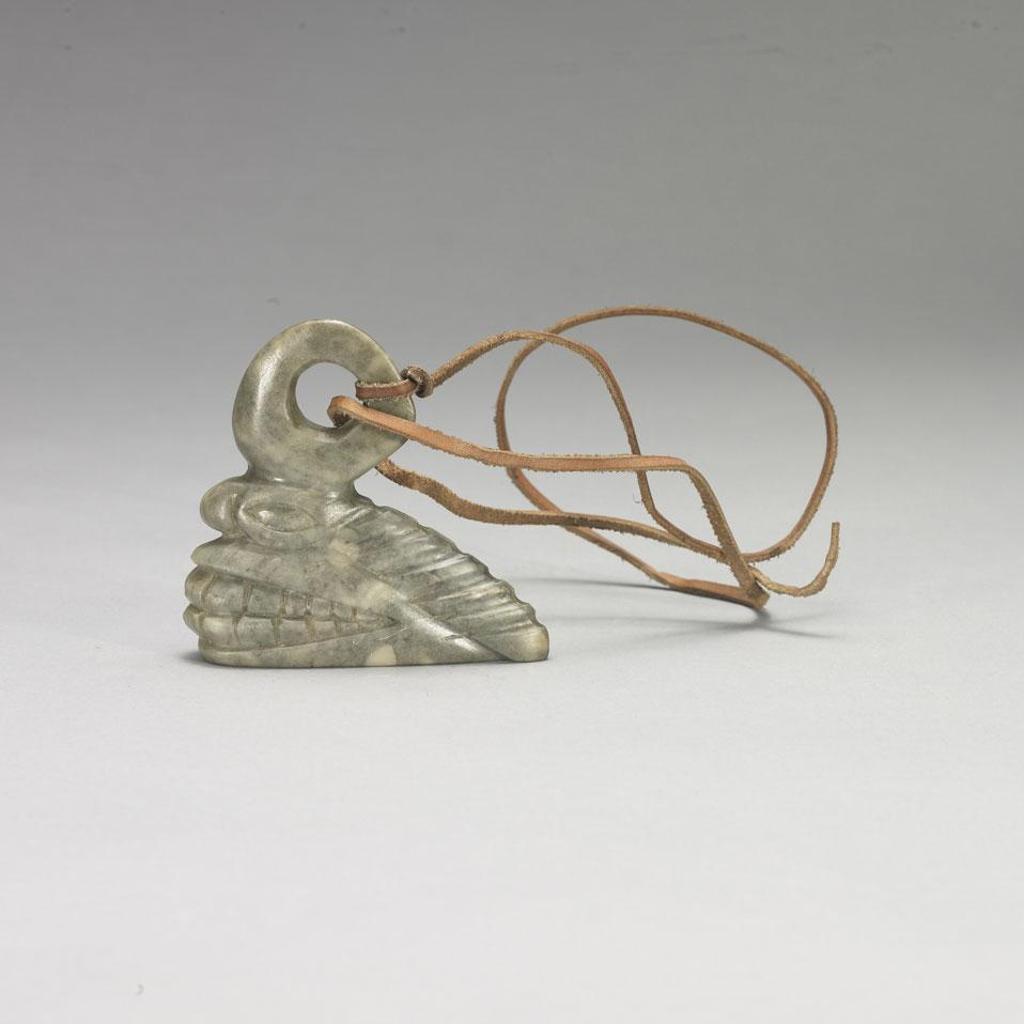 Henry Napartuk (1932-1985) - A Grinning Spirit Amulet, Suspended On A Hide Thong