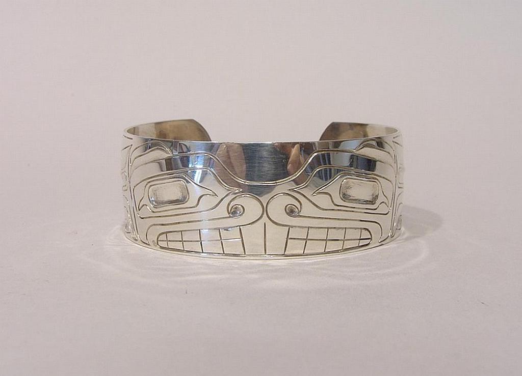 Susan A. Sparrow - a carved silver cuff bracelet