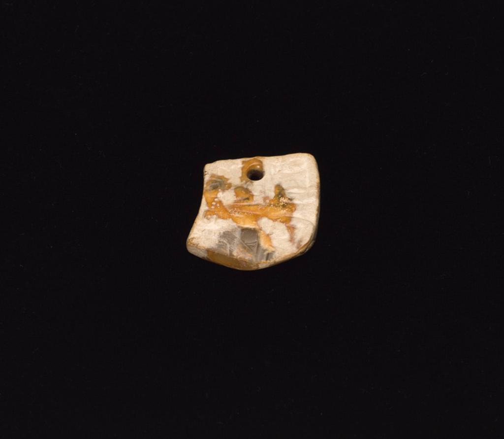 Chinese Art - A Chinese Mottled Jade 'Mask' Pendant, Shang to Zhou Dynasty