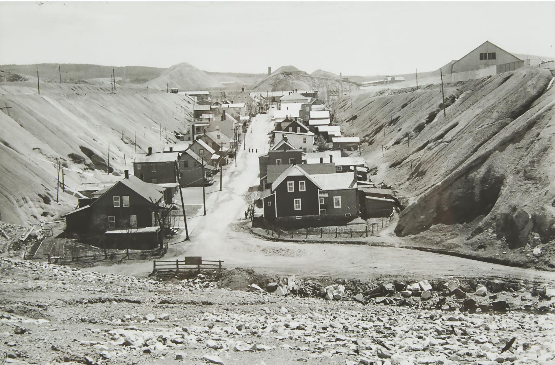 Henri Cartier-Bresson (1908-2004) - Thetford Mines, Rue Smith (Houses In Quarry, Quebec, Canada), 1965