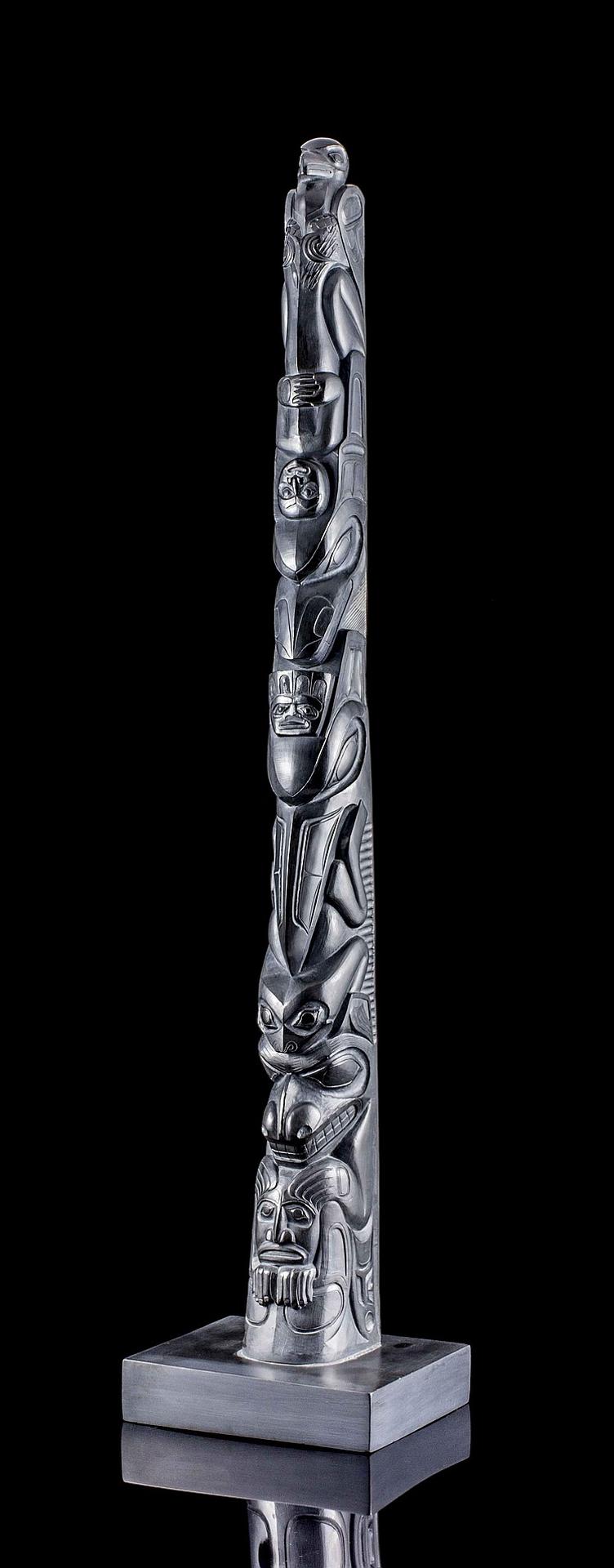Nelson Cross - a large carved argillite pole depicting Eagle