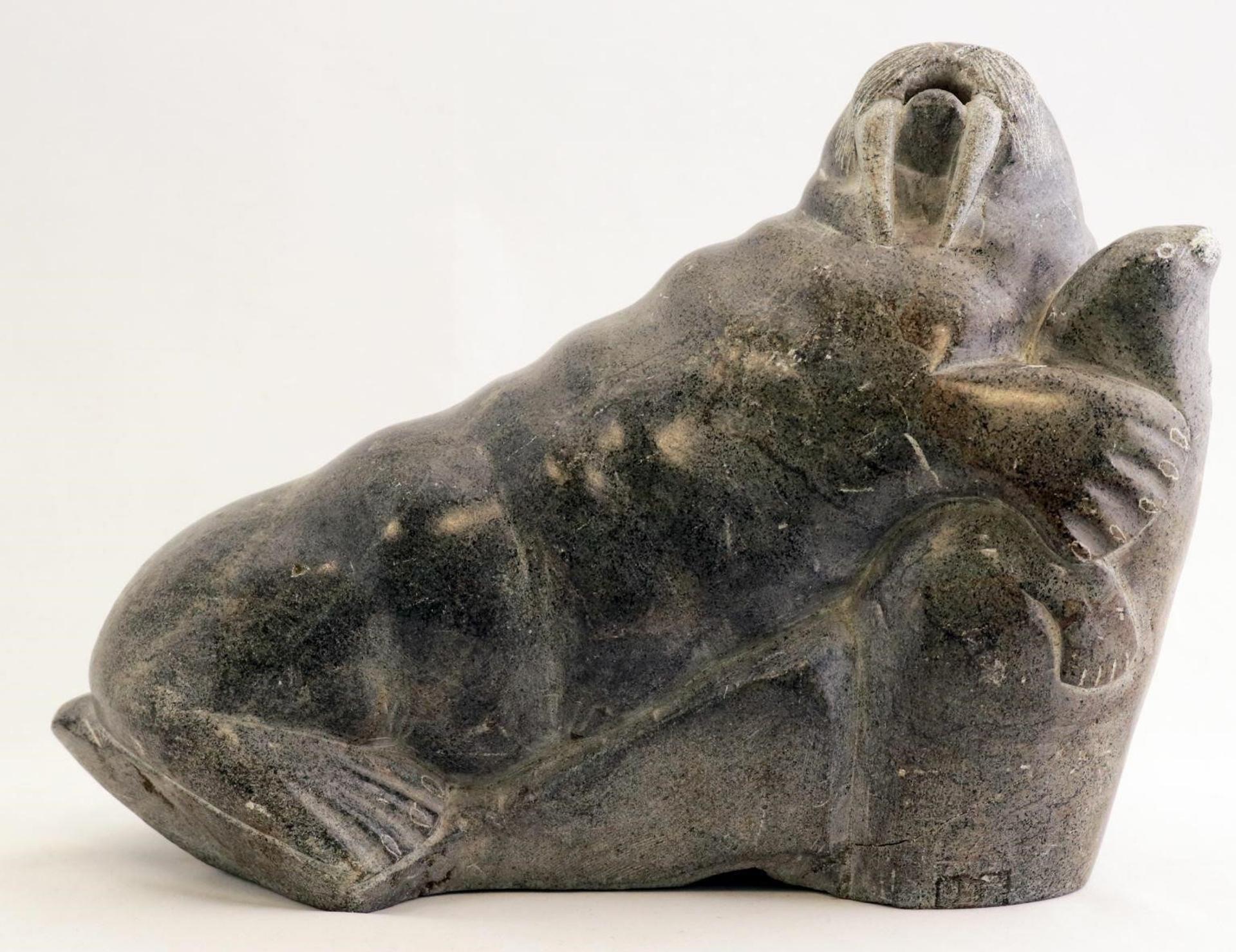 Joshua Nappatu Qaqutu (1936) - a grey stone carving of a Walrus with Pup