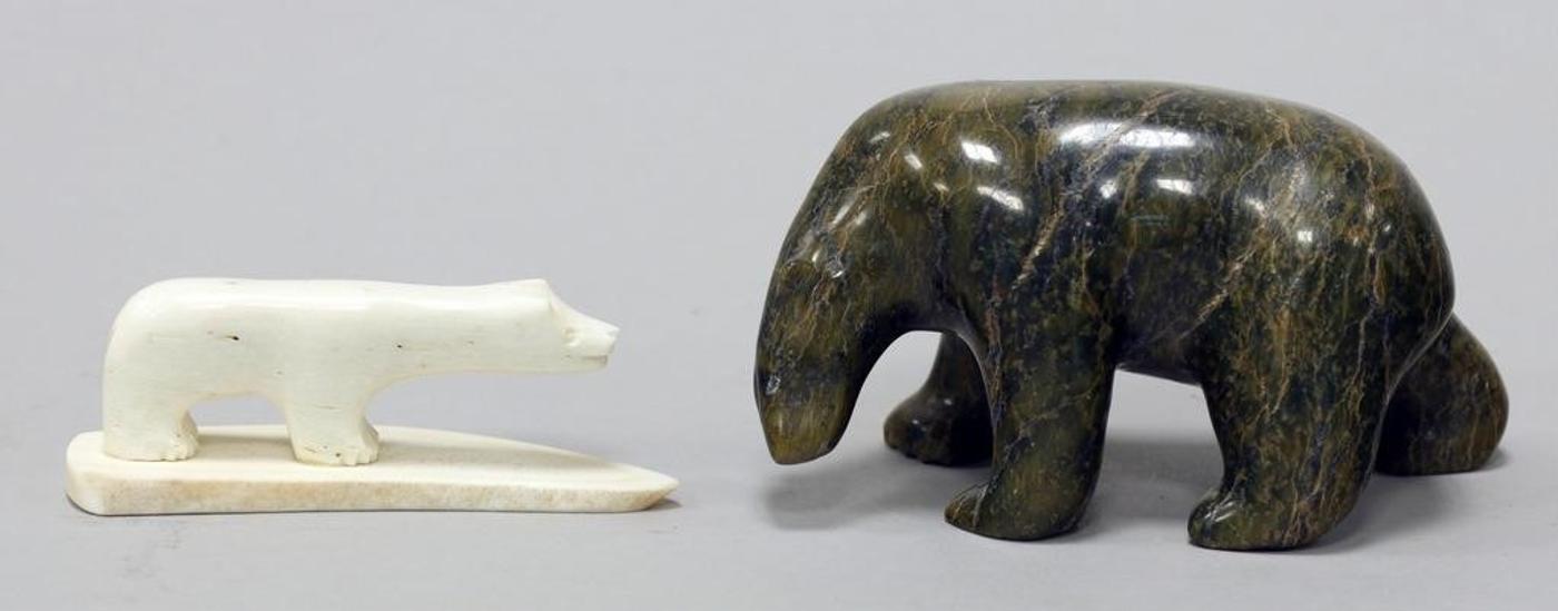 Bear Carvings - Serpentine carving of a Bear (2.25 x 4.25 x 2.5 in.) and an ivory miniature Bear on antler base inscribed Crow ( 1 x 3.25 x 1 in.)