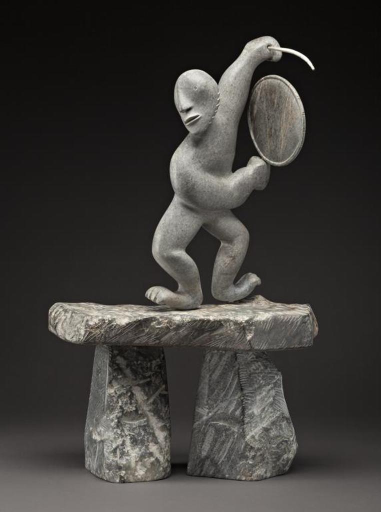 David Ruben Piqtoukun (1950) - Paulatuk/Ontario, Drum Dancer on Inukshuk, 1997, stone