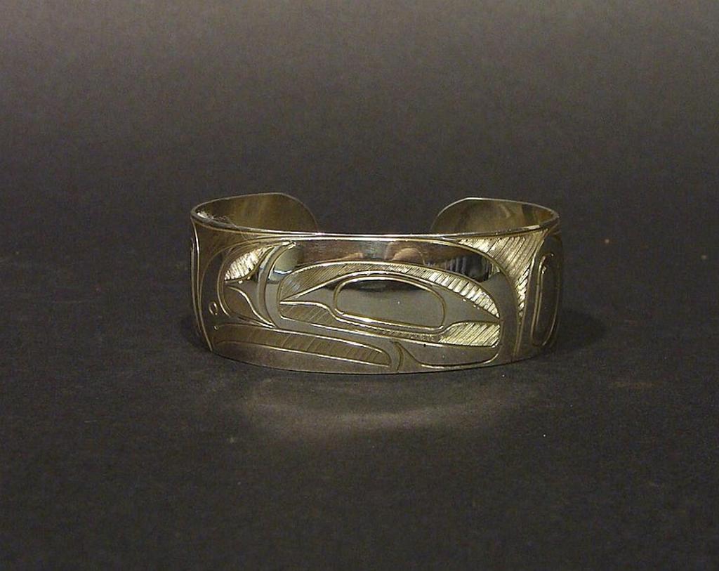 Patrick Seaweed - a carved silver cuff bracelet with Raven design