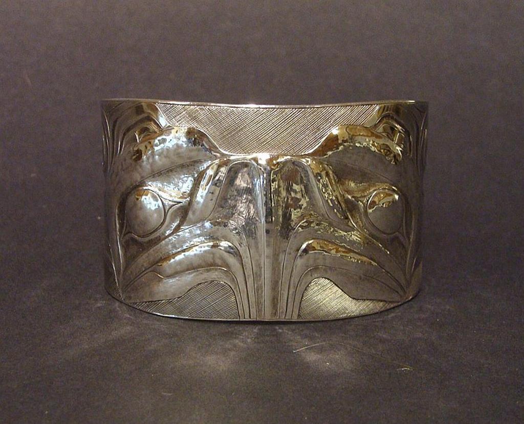 Jay Simeon (1976) - a carved silver cuff bracelet