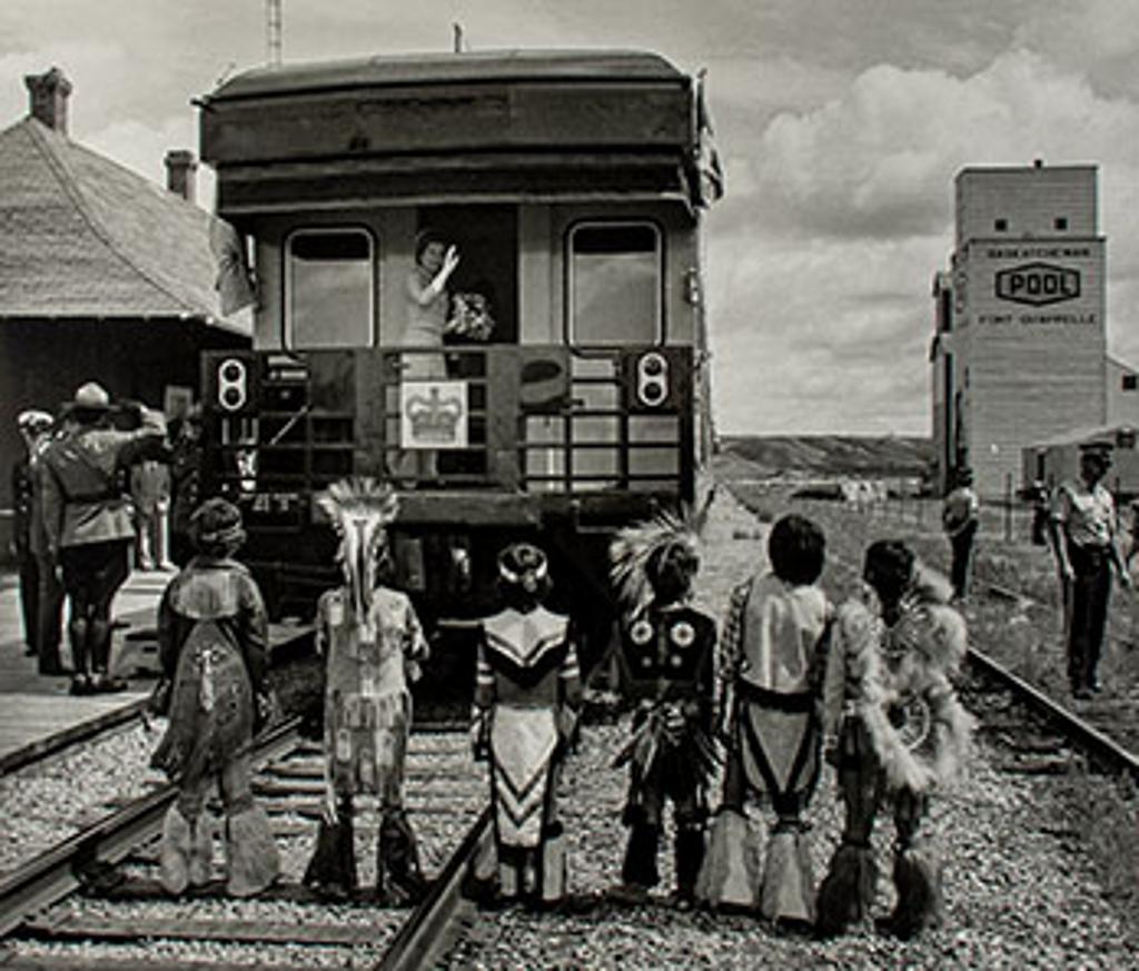 Doug Ball (1953) - The Queen waves to children from the back of her train as she and the Duke of Edinburgh depart Fort Qu’Appelle, Saskatchewan, July 29, 1978